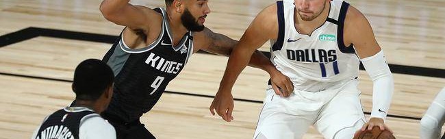  东契奇生涯首个60+三双，独行侠加时险胜马刺  